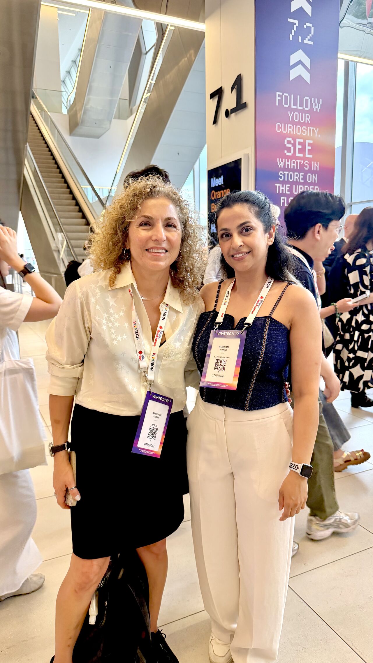 Anousheh Ansari smiling alongside a conference attendee at VivaTech 2026 in Paris.